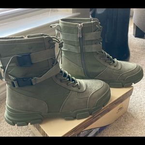 Army green combat boots.